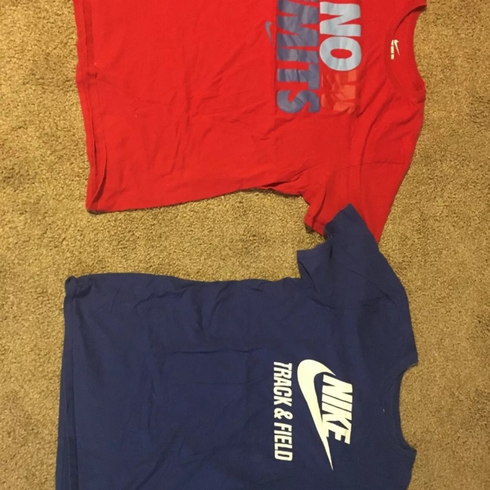 Two Nike t shirts. X large but fit like large